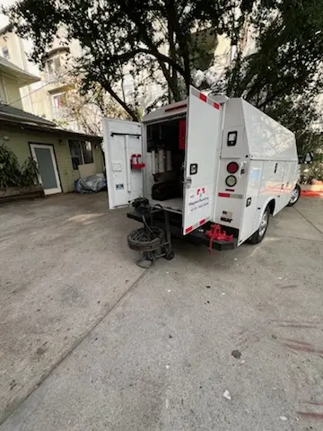 Magnet Plumbing service vehicle on-site for Sewer Line Repair in Miami